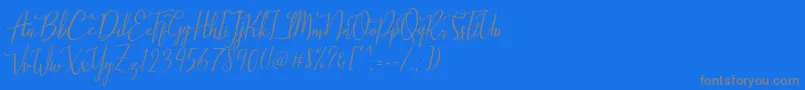 Stellaria-Schriftart – Graue Schriften auf blauem Hintergrund