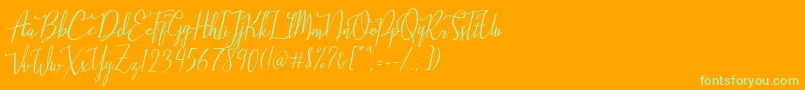 Stellaria-Schriftart – Grüne Schriften auf orangefarbenem Hintergrund