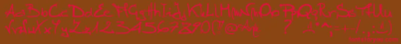 フォントStellina – 赤い文字が茶色の背景にあります。