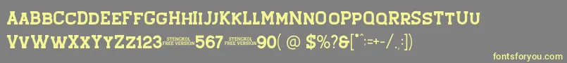 Stengkol 01 Font – Yellow Fonts on Gray Background