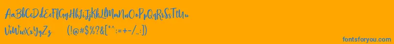 Stephanie Script-Schriftart – Blaue Schriften auf orangefarbenem Hintergrund