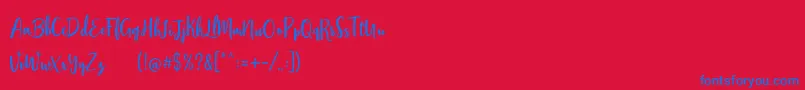 フォントStephanie Script – 赤い背景に青い文字