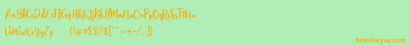 fuente Stephanie Script – Fuentes Naranjas Sobre Fondo Verde