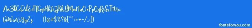 Stephanie Script-Schriftart – Gelbe Schriften auf blauem Hintergrund