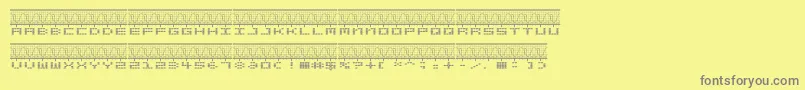 Fonte STEREOLA – fontes cinzas em um fundo amarelo