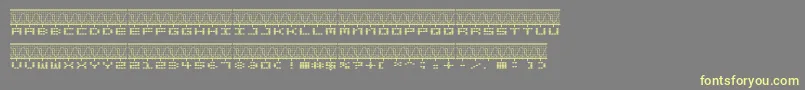 フォントSTEREOLA – 黄色のフォント、灰色の背景