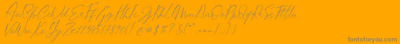 Stifora-Schriftart – Graue Schriften auf orangefarbenem Hintergrund