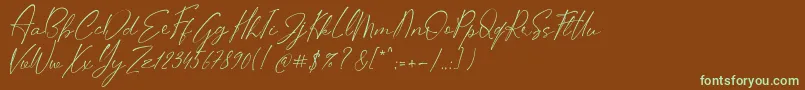 フォントStifora – 緑色の文字が茶色の背景にあります。