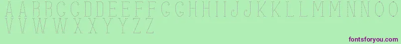 stitches-Schriftart – Violette Schriften auf grünem Hintergrund