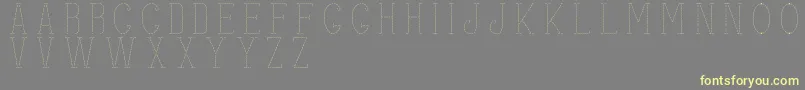 stitches Font – Yellow Fonts on Gray Background