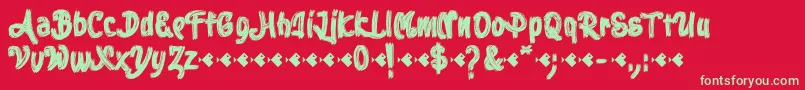 Stoica Brush Font – Green Fonts on Red Background