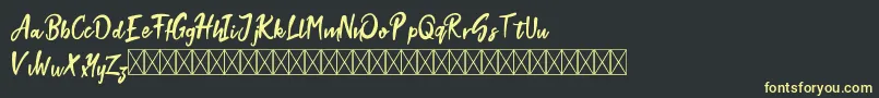 Stokyt Demo Font – Yellow Fonts on Black Background