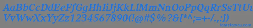 フォントCompatilExquisitLtComBoldItalic – 灰色の背景に青い文字
