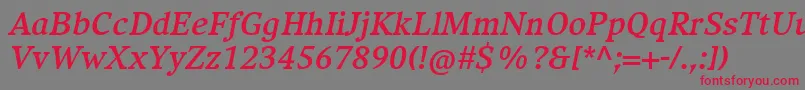 CompatilExquisitLtComBoldItalic-Schriftart – Rote Schriften auf grauem Hintergrund