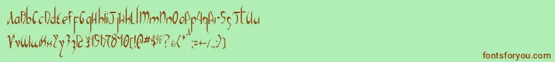 XaphanIiCondensed Font – Brown Fonts on Green Background