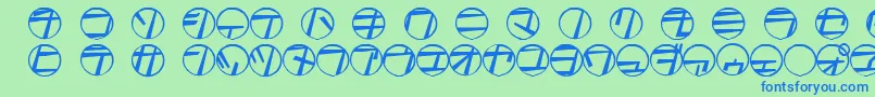 Tamio-Schriftart – Blaue Schriften auf grünem Hintergrund