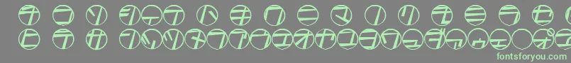 Tamio-Schriftart – Grüne Schriften auf grauem Hintergrund
