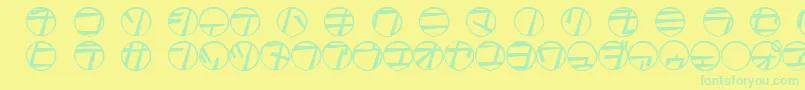 フォントTamio – 黄色い背景に緑の文字