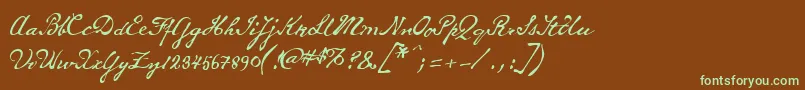 フォントWhitechapelBb – 緑色の文字が茶色の背景にあります。