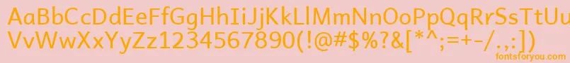 フォントAndikaBasic – オレンジの文字がピンクの背景にあります。