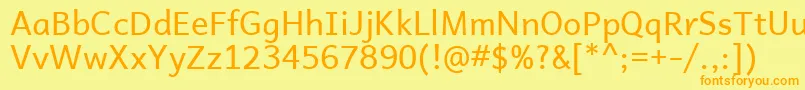 Czcionka AndikaBasic – pomarańczowe czcionki na żółtym tle