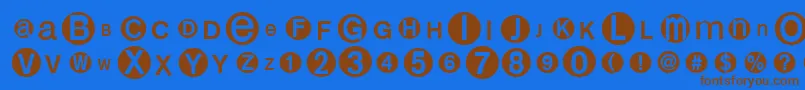 フォントMonoalphabetmultisized – 茶色の文字が青い背景にあります。