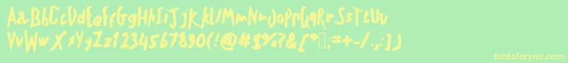 Teschkescratch Font – Yellow Fonts on Green Background