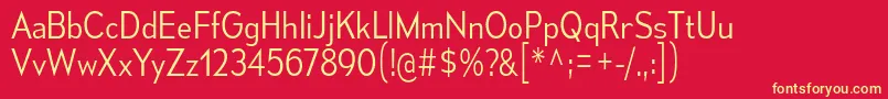 MesmerizeScLt-fontti – keltaiset fontit punaisella taustalla