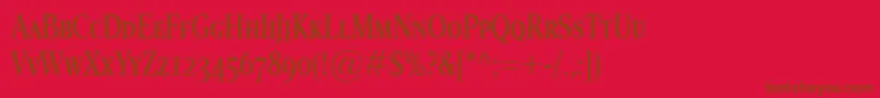 フォントEsperantoCondSmallcaps – 赤い背景に茶色の文字