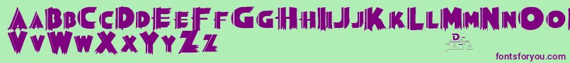 Grauman Font – Purple Fonts on Green Background