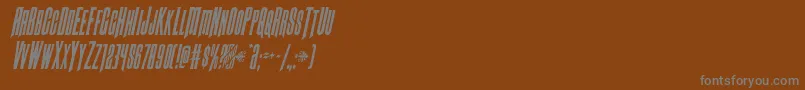 Czcionka Butchsundancecondital – szare czcionki na brązowym tle