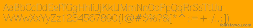 フォントQuorumLightBt – オレンジの背景に灰色の文字