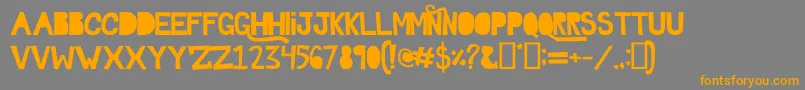 Ghosttown Font – Orange Fonts on Gray Background
