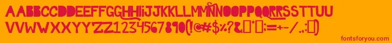 Ghosttown Font – Red Fonts on Orange Background
