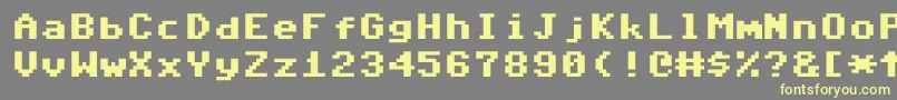 CommodorePixelizedV1.2 Font – Yellow Fonts on Gray Background