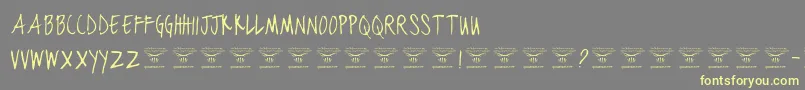 BlackjacketboysThin Font – Yellow Fonts on Gray Background