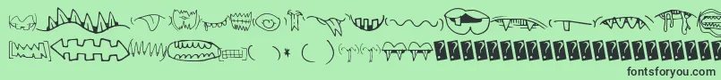 Creaturebuildermouths Font – Black Fonts on Green Background