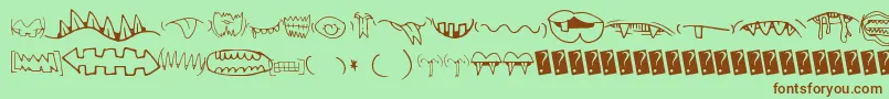 Creaturebuildermouths Font – Brown Fonts on Green Background