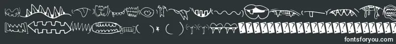 Шрифт Creaturebuildermouths – белые шрифты на чёрном фоне