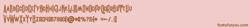 Evolveinline-Schriftart – Braune Schriften auf rosa Hintergrund