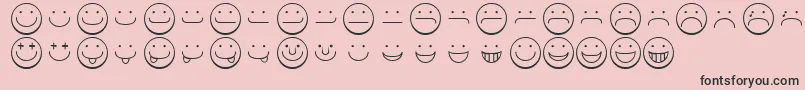 フォントSmileyface – ピンクの背景に黒い文字