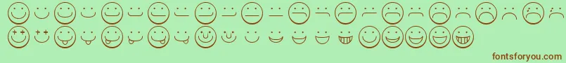 フォントSmileyface – 緑の背景に茶色のフォント