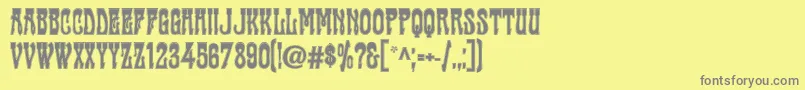 Cabac-fontti – harmaat kirjasimet keltaisella taustalla