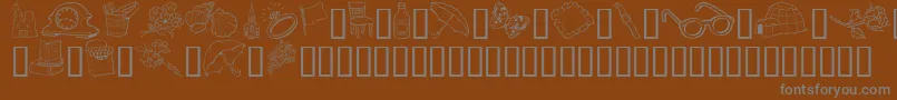 GeGrabBagI-Schriftart – Graue Schriften auf braunem Hintergrund