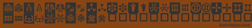 OrientPatternDingsSet3フォントについての詳細 フォントOrientPatternDingsSet3 – 黒い文字が茶色の背景にあります