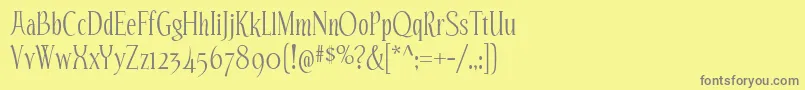 フォントEchelonRg – 黄色の背景に灰色の文字