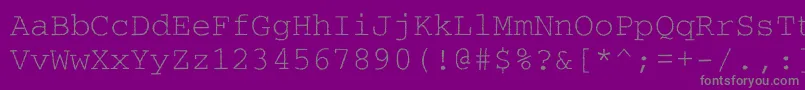 Courierroughc-fontti – harmaat kirjasimet violetilla taustalla