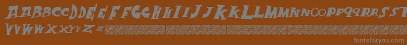 Шрифт Crackking – серые шрифты на коричневом фоне
