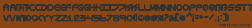 フォントBiometricChubby – 黒い文字が茶色の背景にあります