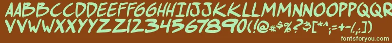 フォントComichustletbsItabold – 緑色の文字が茶色の背景にあります。
